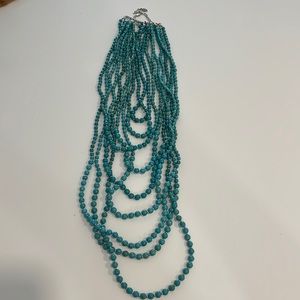 “New”Turquoise Women’s beads, 9 string necklace 21 inches long multi layered.